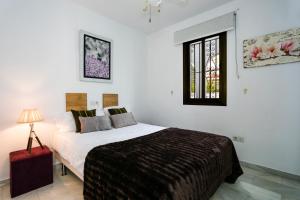 A bed or beds in a room at weforyou near the beach TWO bedrooms in Pueblo Evita