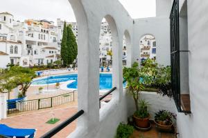 The swimming pool at or close to weforyou near the beach TWO bedrooms in Pueblo Evita