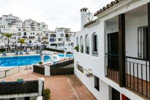 The swimming pool at or close to weforyou near the beach TWO bedrooms in Pueblo Evita