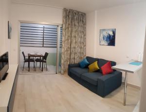 A seating area at VV Canteras Sol y Playa