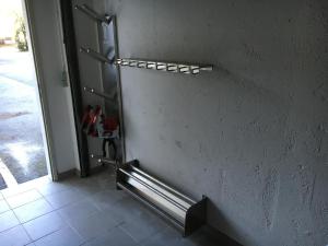 a door to a room with a wall with a refrigerator at Landhaus Erharter in Kitzbühel