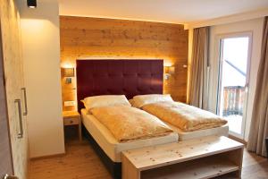 Postel nebo postele na pokoji v ubytování Hotel Conrad + 29 fotografií