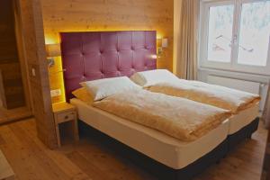 Voodi või voodid majutusasutuse Hotel Conrad toas