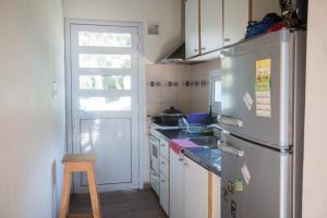 Kuchyň nebo kuchyňský kout v ubytování Tu Morada