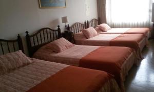 Voodi või voodid majutusasutuse GHL casa hotel toas