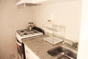 Una cocina o kitchenette en Complejo Amarelo