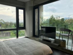 Postel nebo postele na pokoji v ubytování One Piece B&B