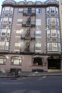 a tall apartment building with a fire escape at Layne Hotel in San Francisco