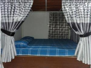 Letto o letti in una camera di Kingfisher Hostel