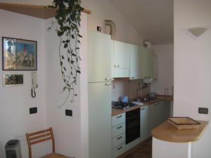 A Casa da Franzにあるキッチンまたは簡易キッチン