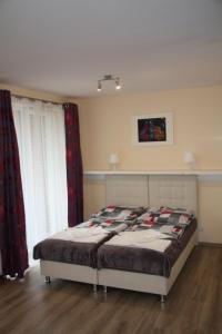 Ένα ή περισσότερα κρεβάτια σε δωμάτιο στο Apartament Tabaco