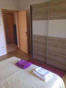 Posteľ alebo postele v izbe v ubytovaní NEW Apartman Ziganto Z near the beach with terrace