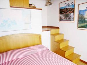 A bed or beds in a room at Alessia