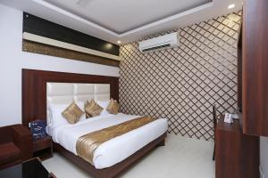Postel nebo postele na pokoji v ubytování Hotel Arch - Near Aerocity New Delhi + 37 fotografií