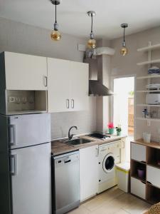 Kuchyň nebo kuchyňský kout v ubytování Apartamento Los Naranjos de Santa Justa