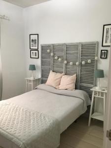 Postel nebo postele na pokoji v ubytování Apartamento Los Naranjos de Santa Justa