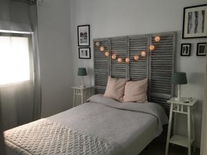 Postel nebo postele na pokoji v ubytování Apartamento Los Naranjos de Santa Justa