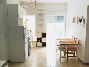 Kuchyň nebo kuchyňský kout v ubytování Apartamento Los Naranjos de Santa Justa