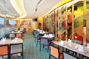 Hotel Ciputra Cibubur managed by Swiss-Belhotel International餐厅或其他用餐的地方