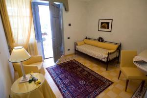 Voodi või voodid majutusasutuse Albergo Castiglione Langhe toas