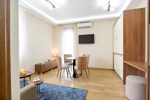 TV a/nebo společenská místnost v ubytování Prime Hotel Apartmani