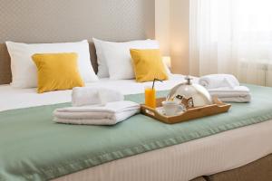 Postel nebo postele na pokoji v ubytování Prime Hotel Apartmani