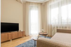 TV a/nebo společenská místnost v ubytování Prime Hotel Apartmani