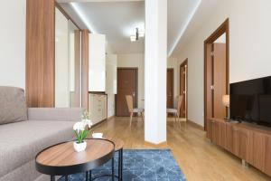TV a/nebo společenská místnost v ubytování Prime Hotel Apartmani