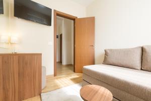 TV a/nebo společenská místnost v ubytování Prime Hotel Apartmani