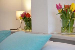 Postel nebo postele na pokoji v ubytování Hotel Kramer