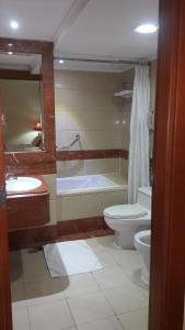 
Ванная комната в Golden Hotel
