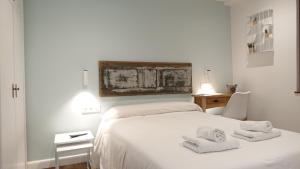 Postel nebo postele na pokoji v ubytování Hotel San Nikolas Sea Views