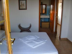 A bed or beds in a room at Son Set Villa