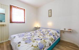 Postel nebo postele na pokoji v ubytování Apartments Jadranovo