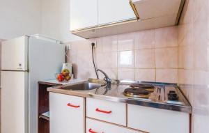 Kuchyň nebo kuchyňský kout v ubytování Apartments Jadranovo