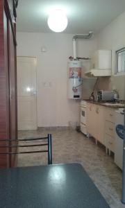 Una cocina o kitchenette en Departamentos Niñas