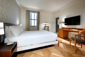 Un pat sau paturi într-o cameră la Eurostars Langford