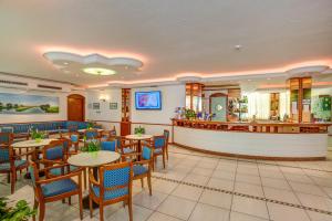 TV a/nebo společenská místnost v ubytování Hotel Smeraldo