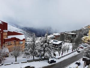 겨울의 NUEVO APARTAMENTO en Sierra Nevada CON GARAJE e IMPRESIONANTES VISTAS