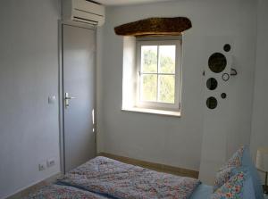 a bedroom with a bed and a window at Villa Kentic in Buzet +15 photos