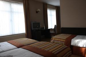 Katil atau katil-katil dalam bilik di Hotel Giorgi