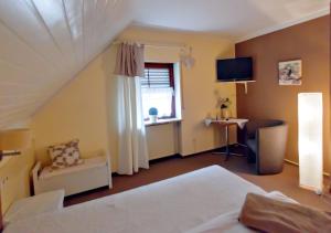 Postel nebo postele na pokoji v ubytování Hotel Kattenbeck
