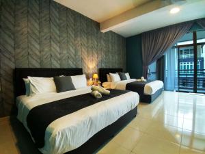 Ein Bett oder Betten in einem Zimmer der Unterkunft Le Bleu Malacca