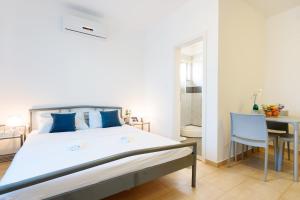 Posteľ alebo postele v izbe v ubytovaní Very Special Apartments