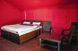 Voodi või voodid majutusasutuse Jungle Stays toas