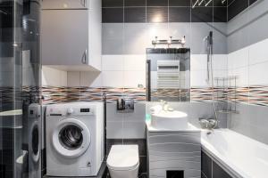 Kúpeľňa v ubytovaní P&O Serviced Apartments GOCLAW + 3 fotografie