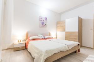 Postel nebo postele na pokoji v ubytování Apartment Sali Dugi Otok