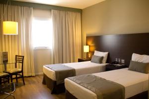 Cama ou camas em um quarto em Hotel Panamby São Paulo