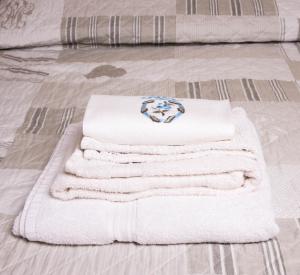 A bed or beds in a room at La Casetta B&B
