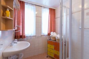 Koupelna v ubytování Appartement Roland + 37 fotografií